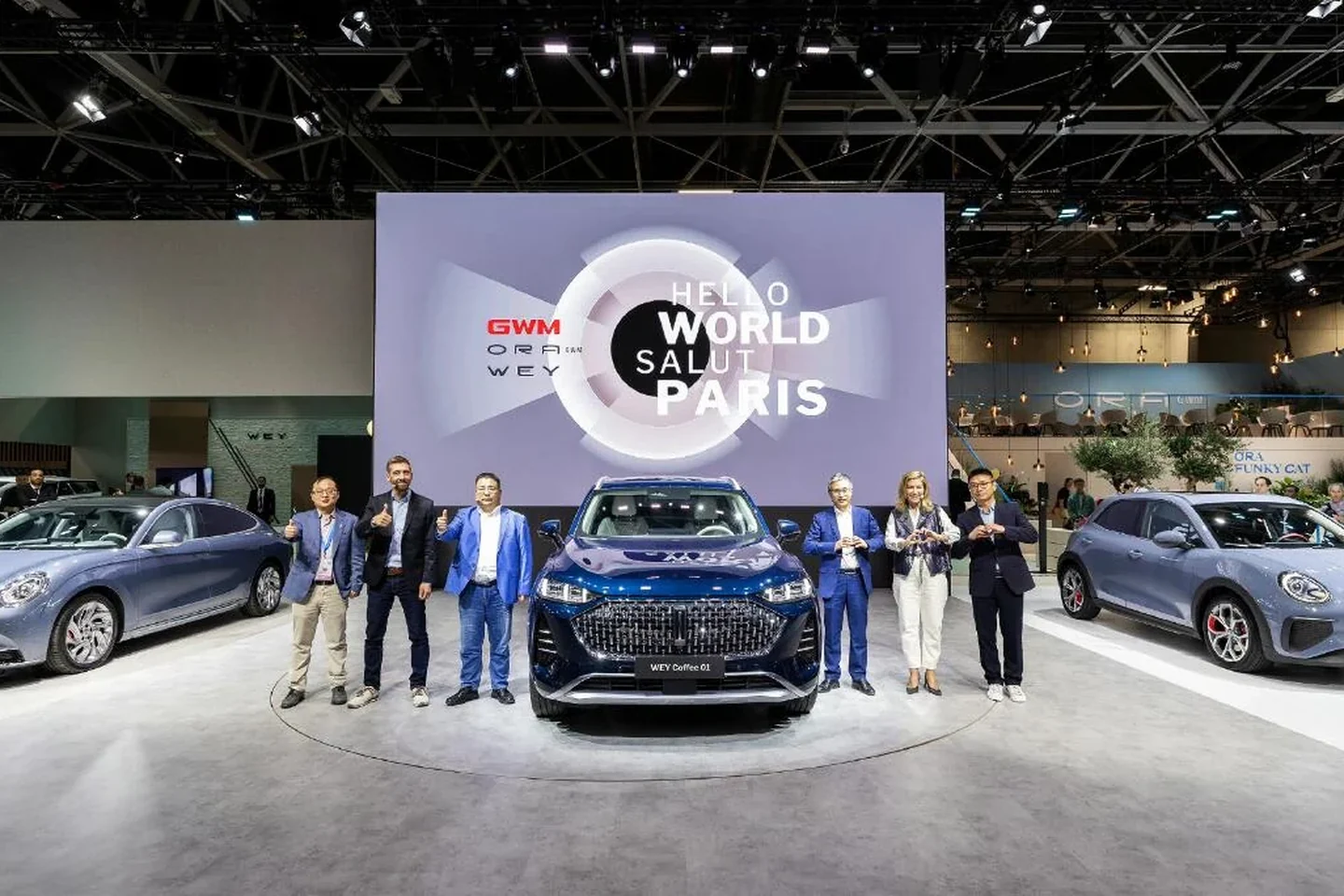 Automotive team and vehicles at the Paris motor show